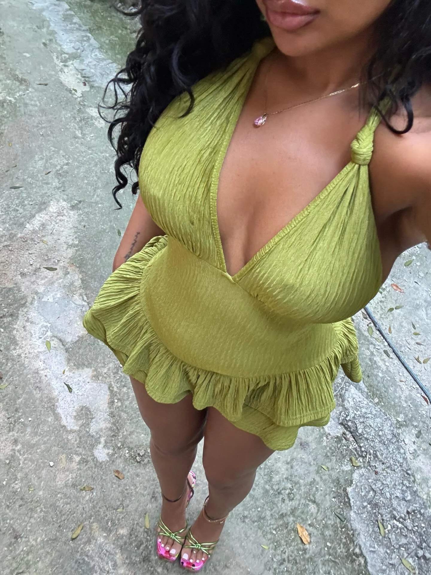 Photo by Alexandra on February 17, 2026. May be an image of sandals, halter top, sundress, overskirt and text.