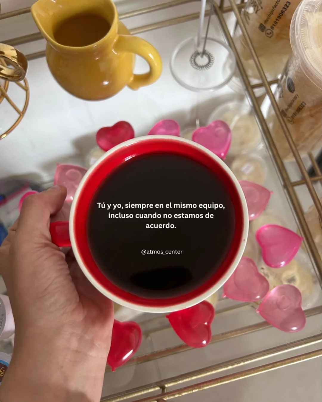 Photo shared by Almu Solis on February 23, 2026 tagging @atmos_center. May be an image of coffee cup, heart, coffee, mug, cup, kitchenware, tea and text that says 'Tú yo, siempre en el mismo equipo, incluso cuando inclusocuandonoestamosde no estamos de acuerdo. @atmos_center'.