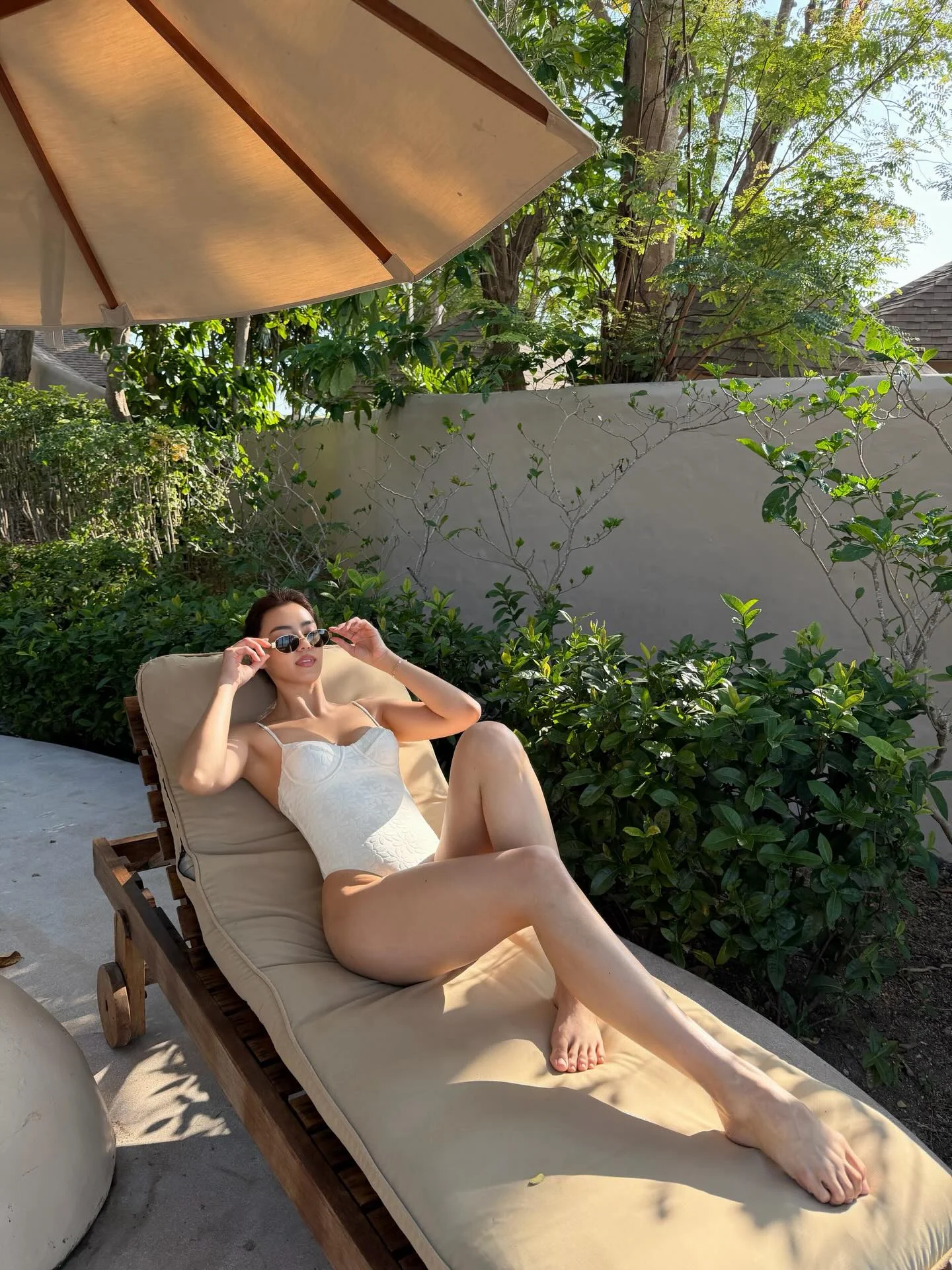 Photo by Amanda Obdam on March 17, 2026. May be an image of parasol, deck chair, chaise lounge, pool and text.