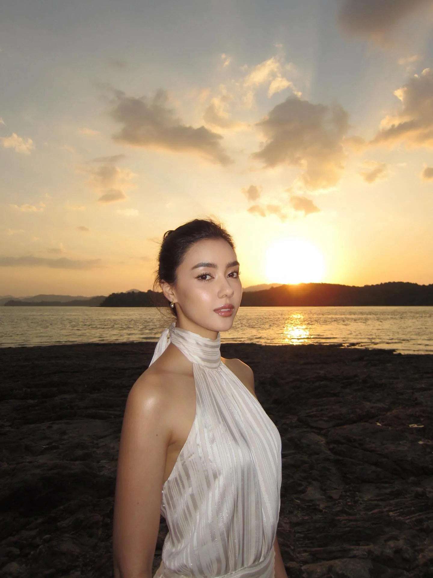 Photo by Amanda Obdam on March 18, 2026. May be an image of one or more people, makeup, hair, gown, dress, outdoors and text.