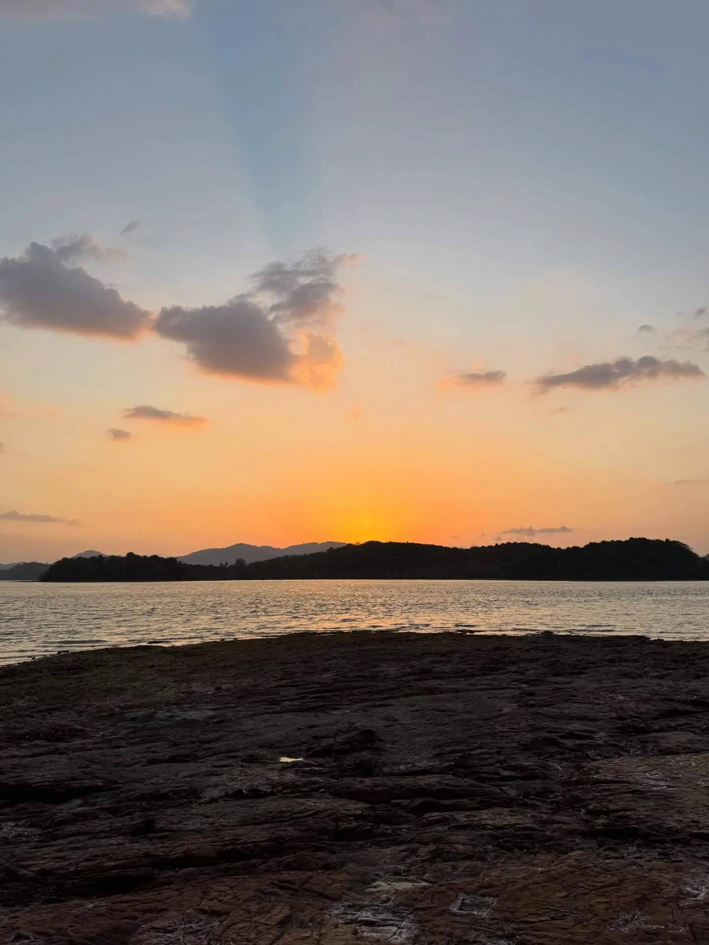 Photo by Amanda Obdam on March 18, 2026. May be an image of cloud, twilight, horizon, beach, lake and text.