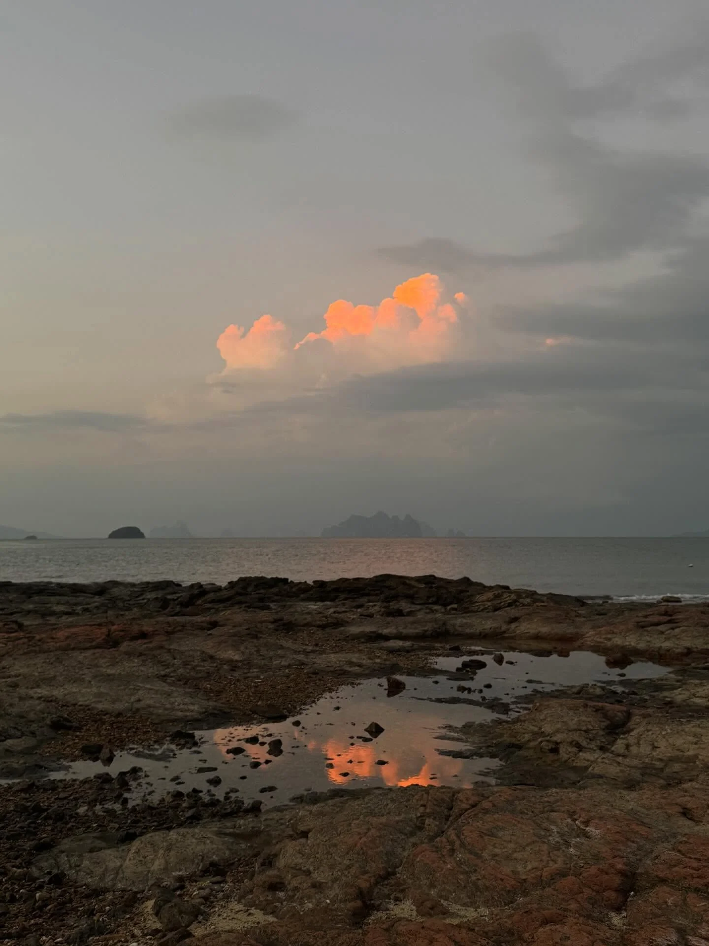 Photo by Amanda Obdam on March 18, 2026. May be an image of cloud, twilight, horizon, ocean, nature and text.