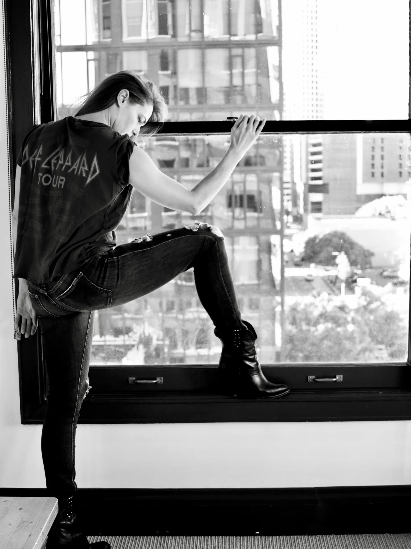 Photo by the bare magazine on March 11, 2026. May be a black-and-white image of fire escape, window and text.