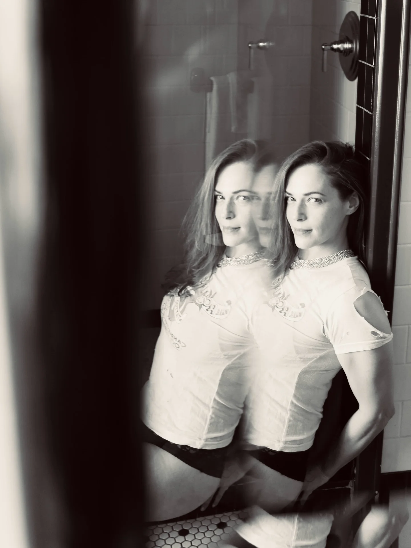 Photo by the bare magazine on March 11, 2026. May be a black-and-white image of mirror and text.