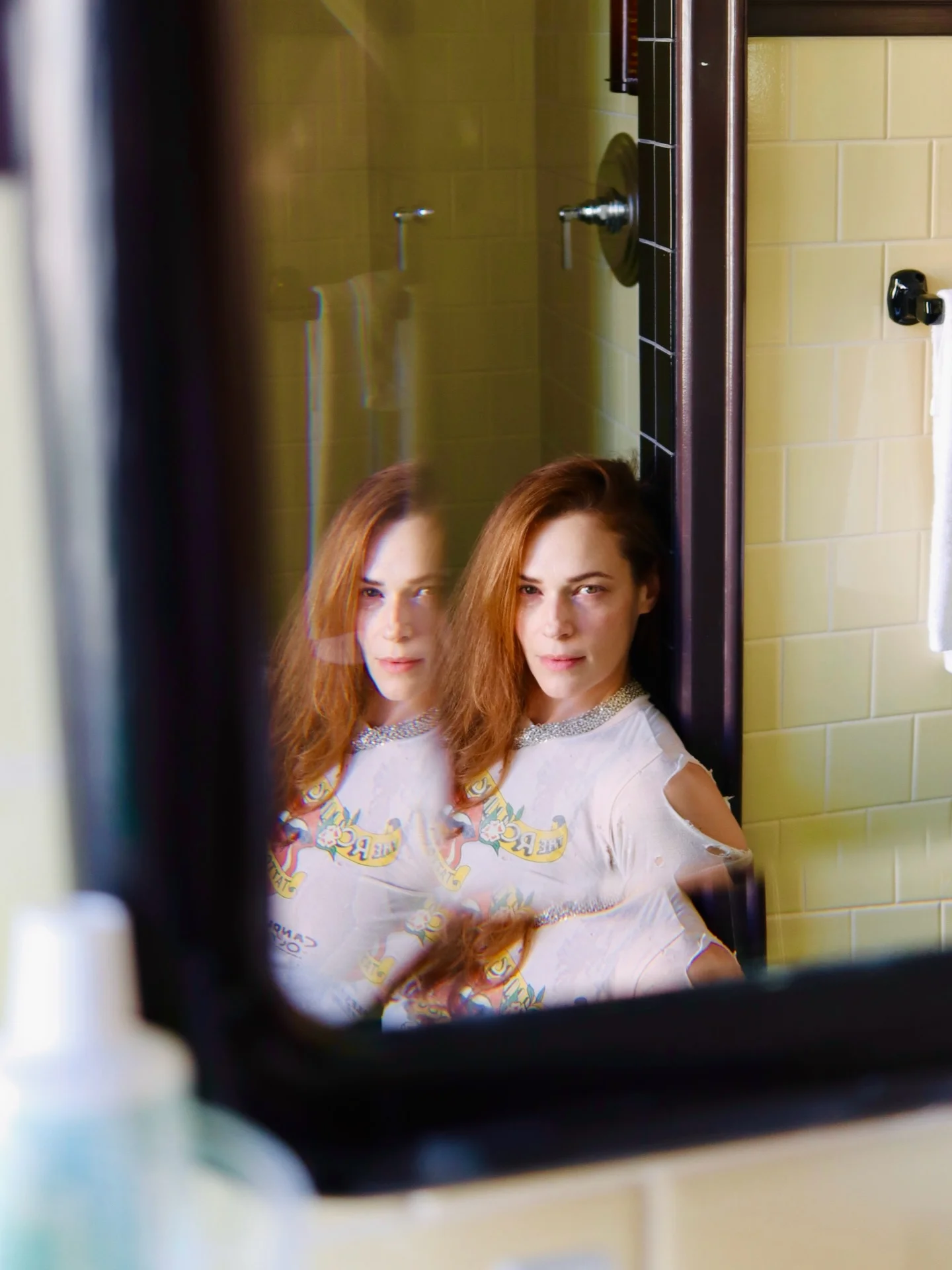 Photo by the bare magazine on March 11, 2026. May be an image of one or more people, makeup, rearview mirror, mirror and text.