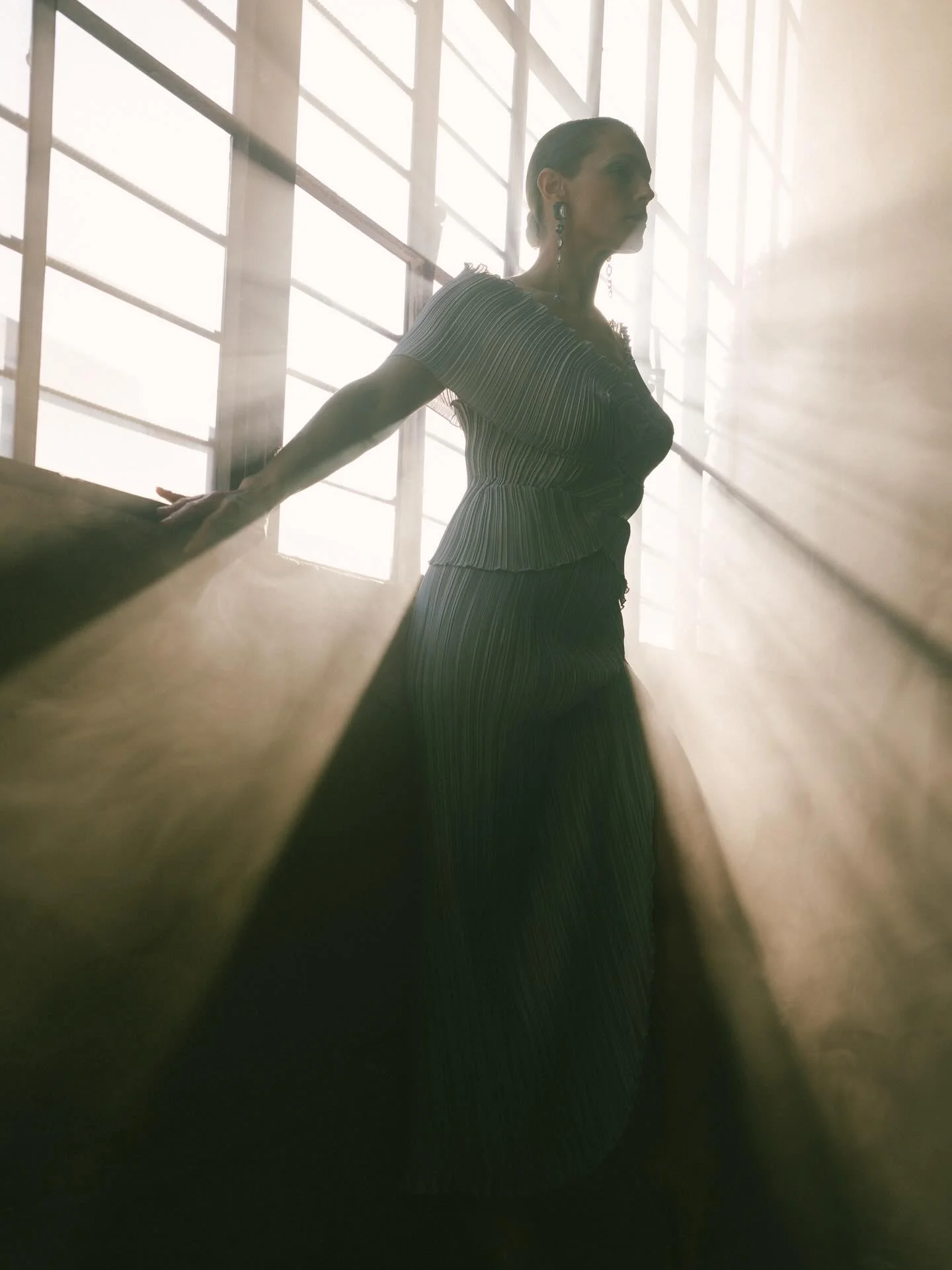 Photo by 71 Magazine on March 18, 2026. May be an image of one or more people, makeup, gown, dress and text.