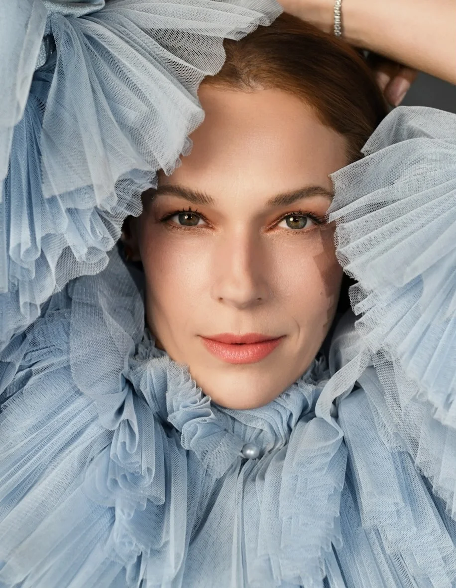 Photo by Elevated Magazines on March 21, 2026. May be an image of one or more people, makeup and text.