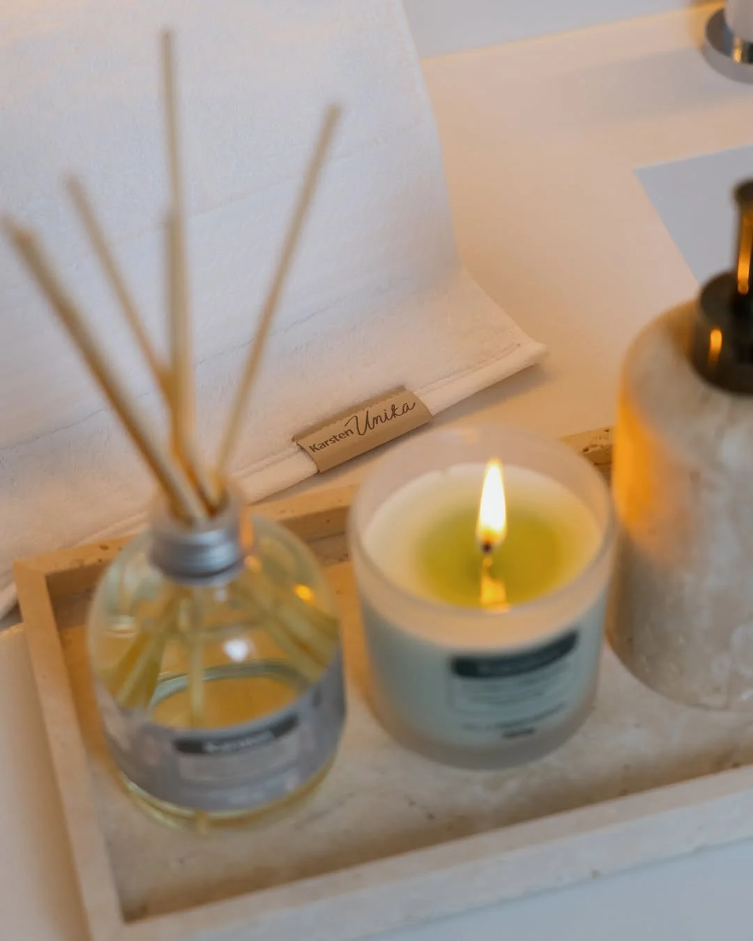 Photo by Amanda Ferrari on February 18, 2026. May be an image of sink, fragrance, candle, bar soap, hand cream and text that says 'Karsten arstenUnika nika'.