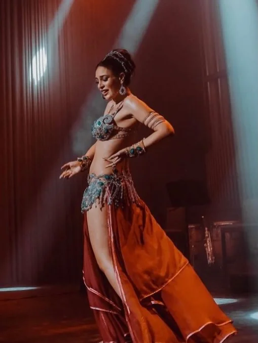 Photo by Amie Sultan ايمي سلطان on March 28, 2026. May be an image of dancing, costume and text.