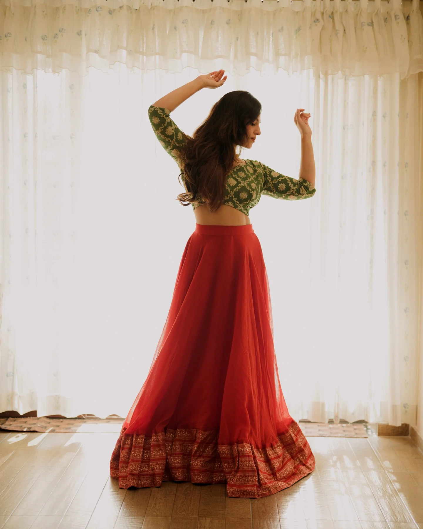 Photo by Amitha Mathew Jobin on March 12, 2026. May be an image of dancing, skirt, curtains and text.
