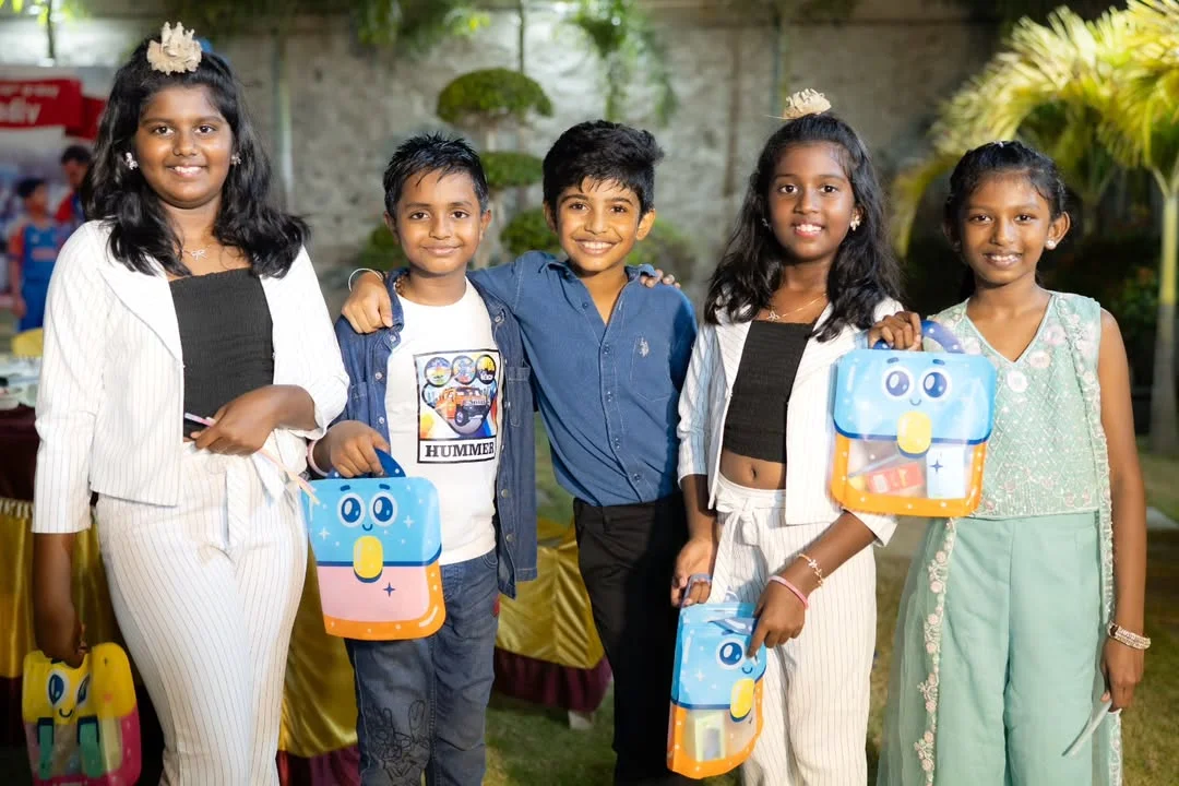 Photo by Abishek Chandamarakshan on February 27, 2026. May be an image of child, smiling, standing, picnic and text that says 'HUMMER 00'.