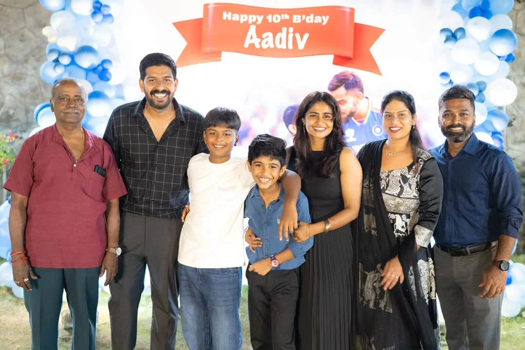 Photo by Abishek Chandamarakshan on February 27, 2026. May be an image of one or more people, people smiling, people standing, balloon, picnic and text that says 'Happy 10th B'day Aadiv K'.