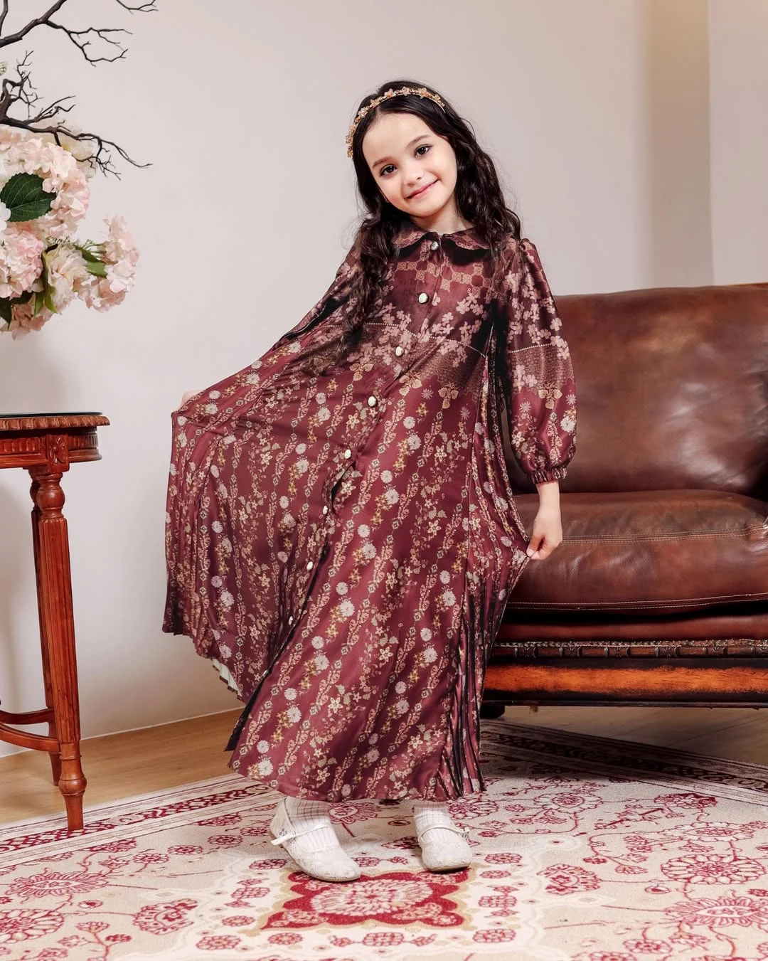 Photo by Seradia on February 19, 2026. May be an image of child, sleepwear, dress, net, tunic and text.